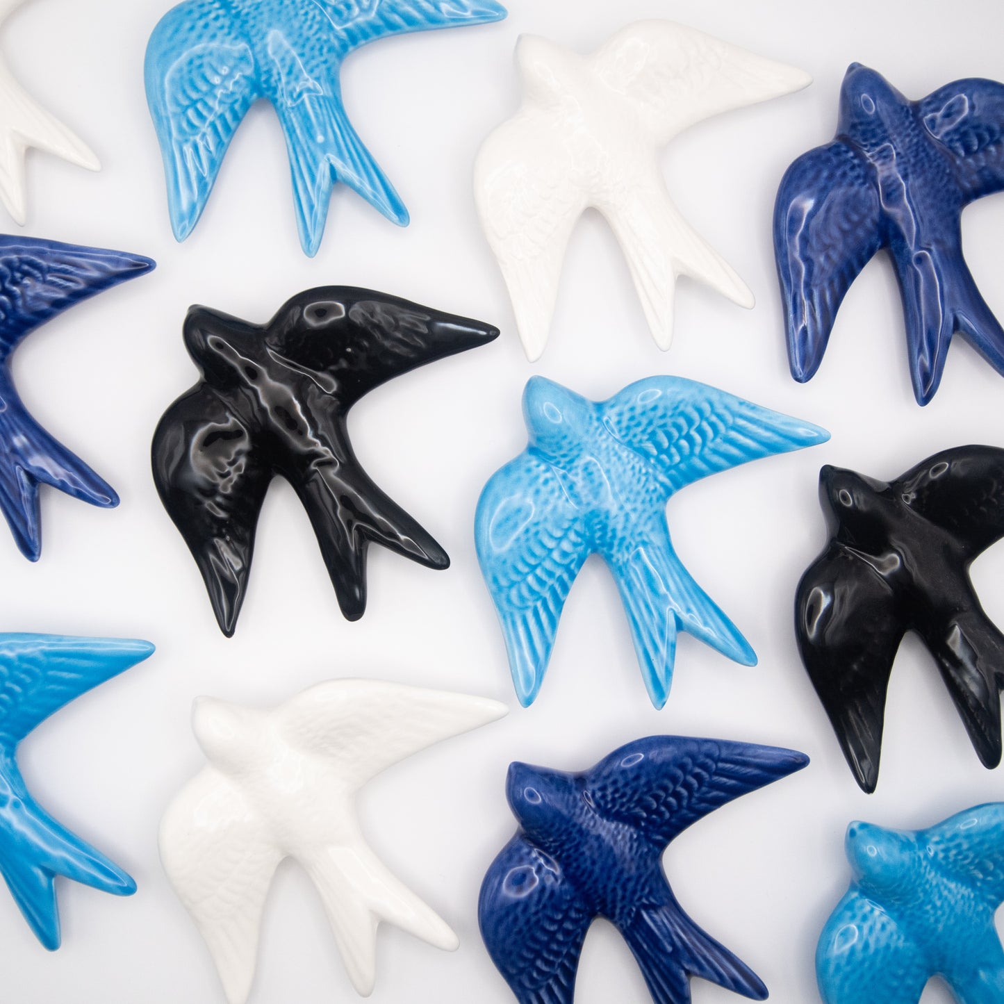 Hirondelle en céramique bleue turquoise